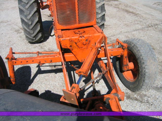 image for item 1100 1955 Allis Chalmers WD45 broom tractor