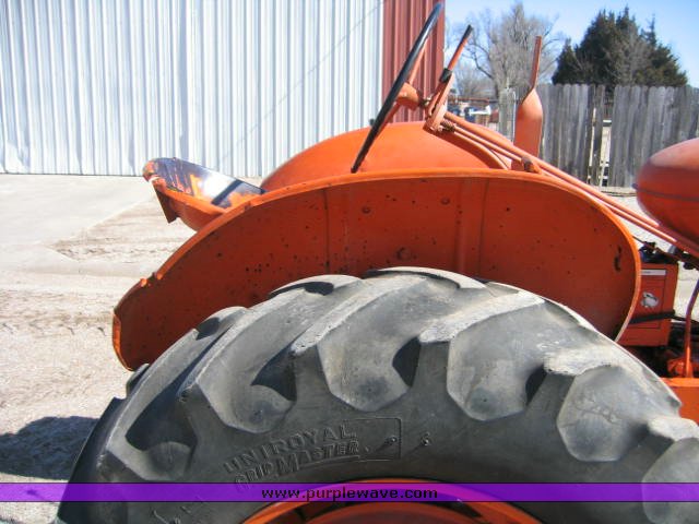 image for item 1100 1955 Allis Chalmers WD45 broom tractor