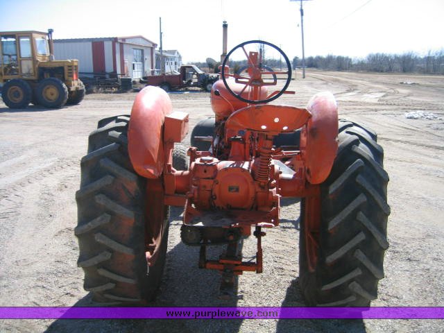 image for item 1100 1955 Allis Chalmers WD45 broom tractor