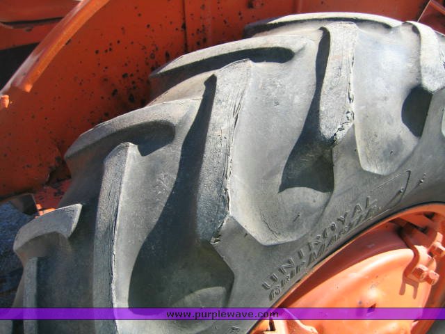 image for item 1100 1955 Allis Chalmers WD45 broom tractor