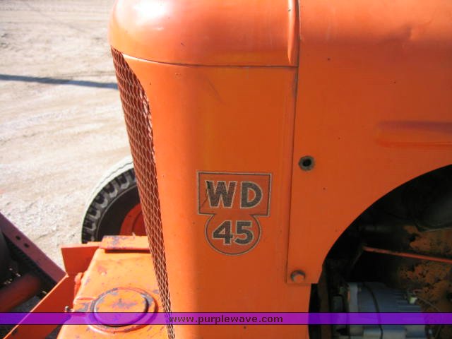 image for item 1100 1955 Allis Chalmers WD45 broom tractor