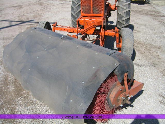 image for item 1100 1955 Allis Chalmers WD45 broom tractor