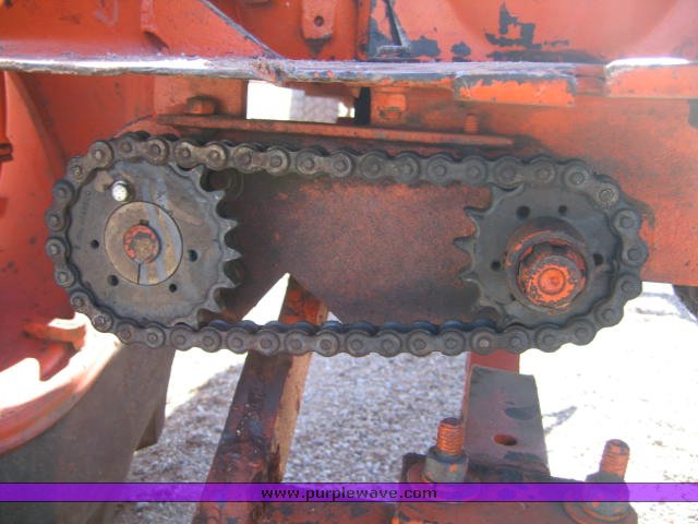 image for item 1100 1955 Allis Chalmers WD45 broom tractor