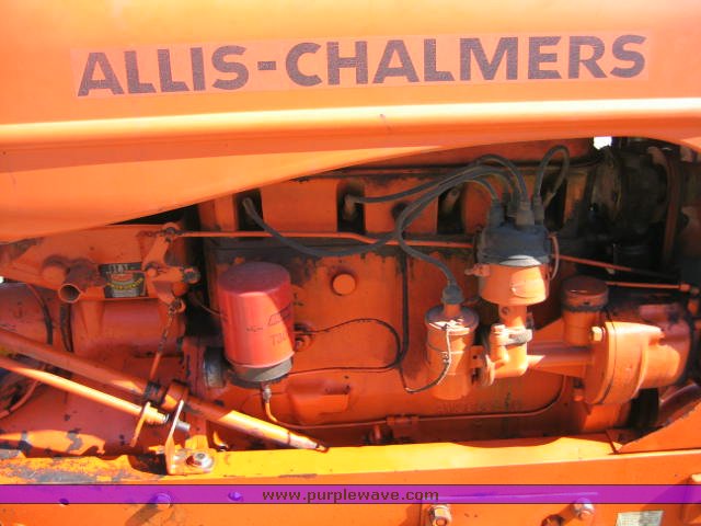 image for item 1100 1955 Allis Chalmers WD45 broom tractor