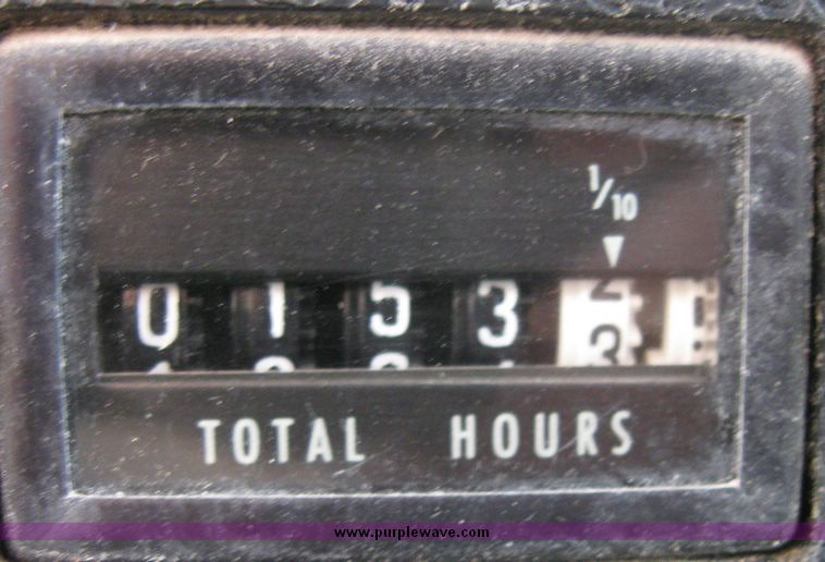 image for item 2061 1978 Ford F-700 pole digger truck