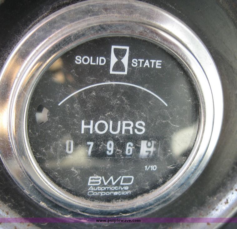 image for item 2061 1978 Ford F-700 pole digger truck