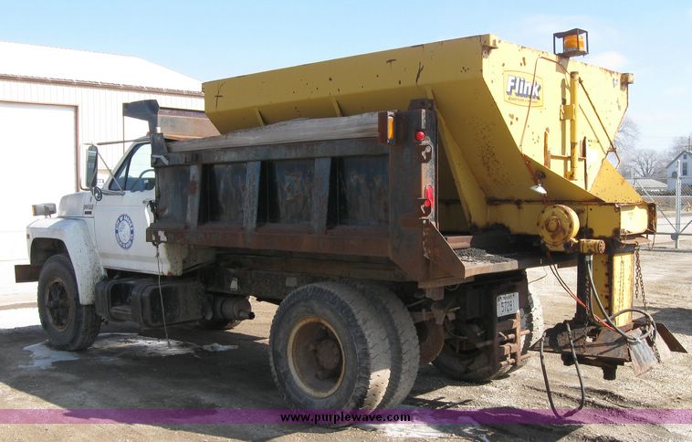 image for item 2075 1990 Ford F-700 dump truck with 8' Flink spreader body