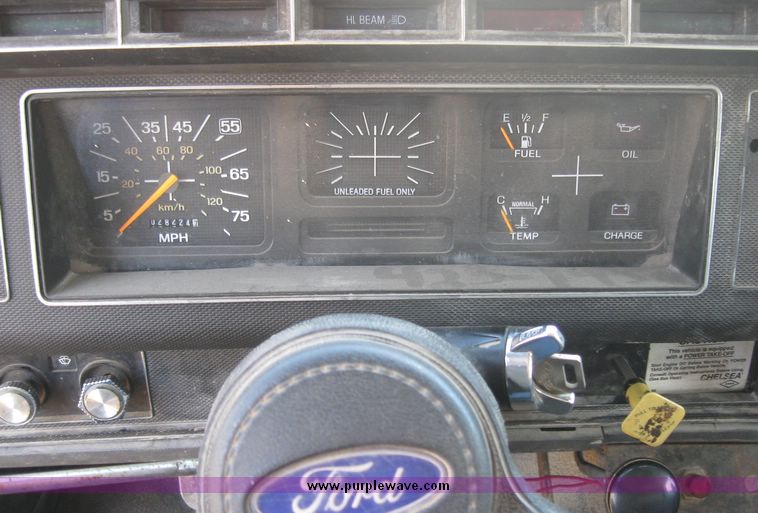 image for item 2075 1990 Ford F-700 dump truck with 8' Flink spreader body