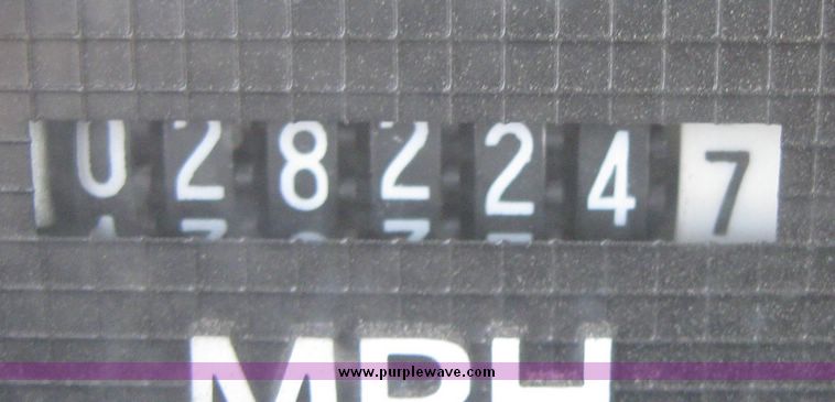 image for item 2075 1990 Ford F-700 dump truck with 8' Flink spreader body