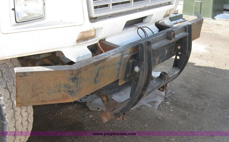 image for item 2075 1990 Ford F-700 dump truck with 8' Flink spreader body