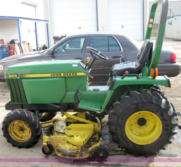 image for item 3355 1994 John Deere 855 MFWD utility tractor with belly mount mower