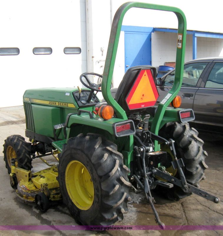 image for item 3355 1994 John Deere 855 MFWD utility tractor with belly mount mower
