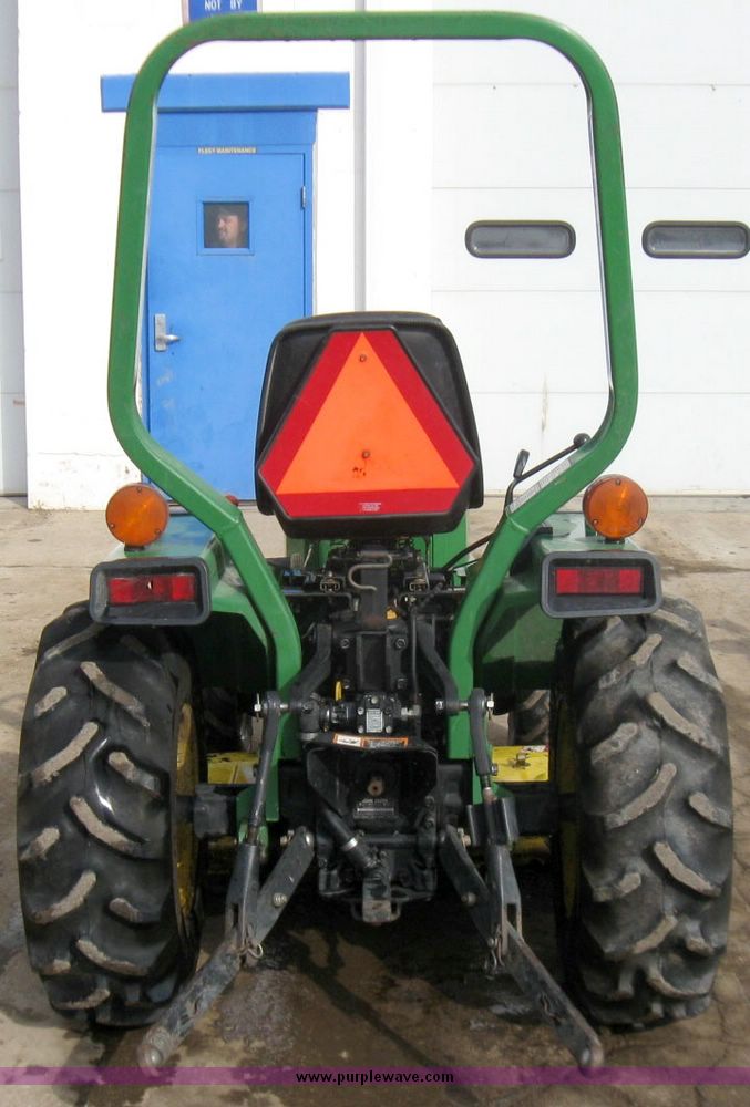 image for item 3355 1994 John Deere 855 MFWD utility tractor with belly mount mower