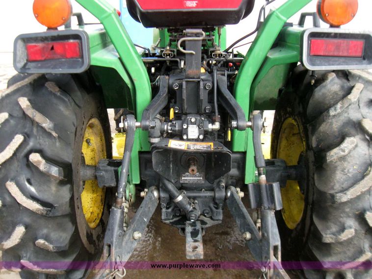 image for item 3355 1994 John Deere 855 MFWD utility tractor with belly mount mower