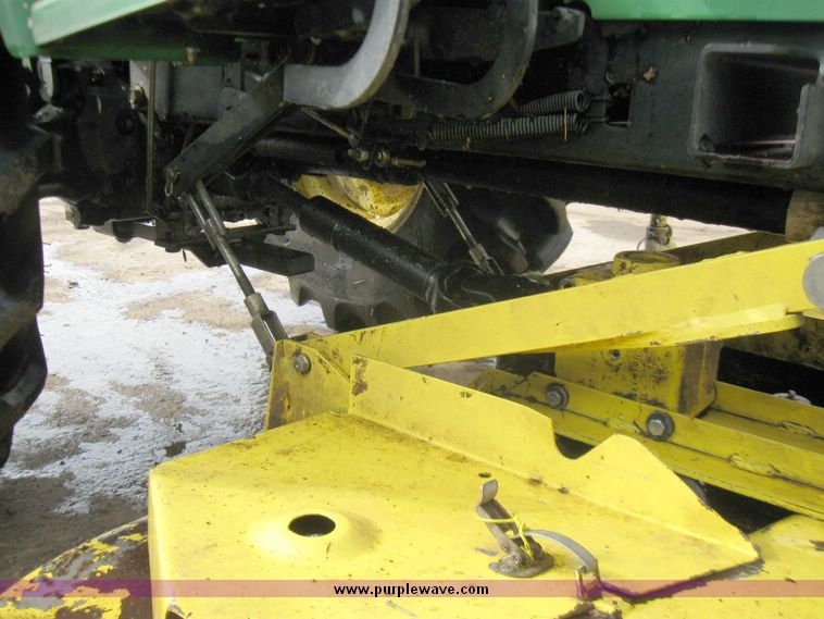 image for item 3355 1994 John Deere 855 MFWD utility tractor with belly mount mower