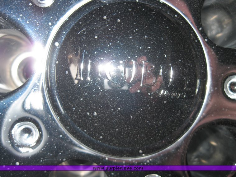 image for item 8204 (4) 265-35R22 102H Falken tires on Incubus rims