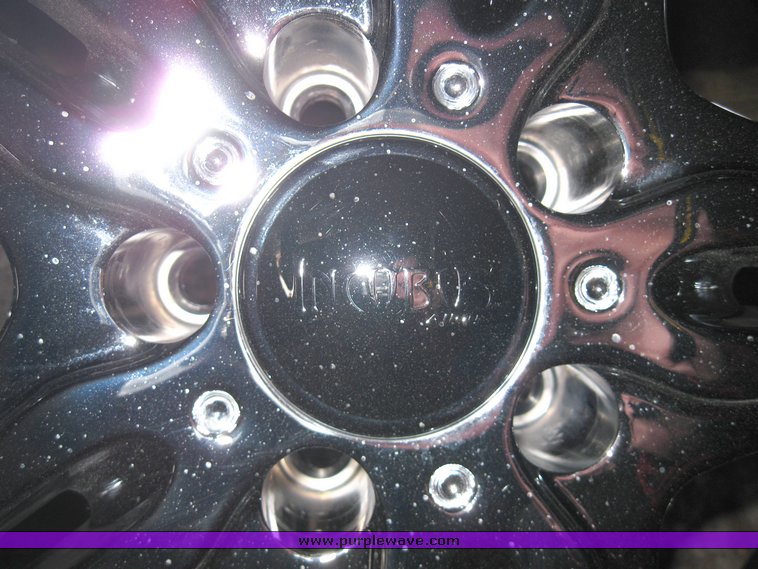 image for item 8204 (4) 265-35R22 102H Falken tires on Incubus rims