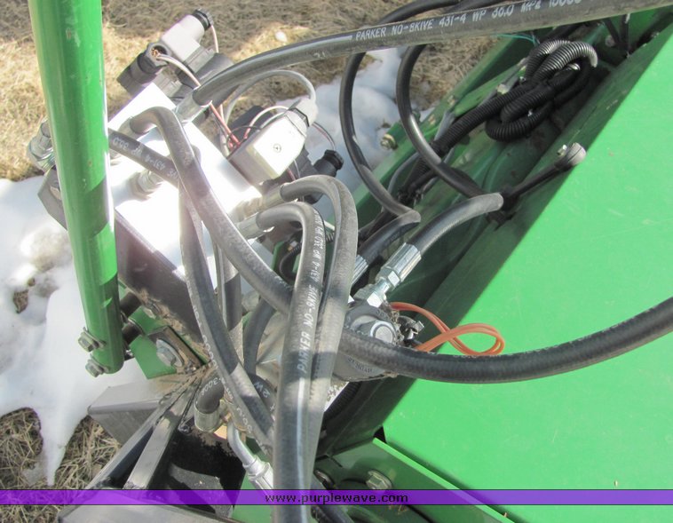 image for item 3025 2005 John Deere 7460 cotton stripper