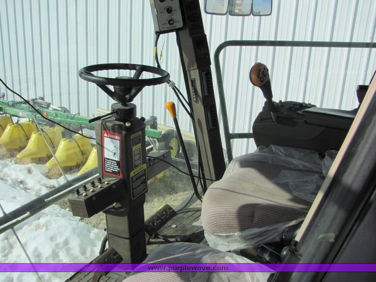 image for item 3025 2005 John Deere 7460 cotton stripper