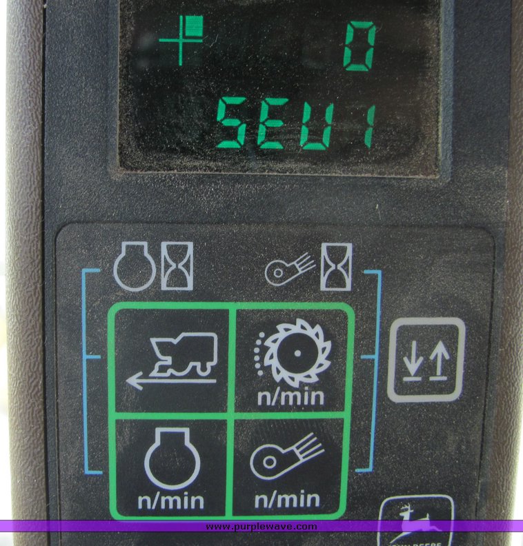 image for item 3025 2005 John Deere 7460 cotton stripper