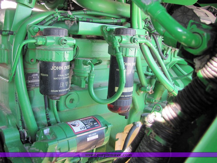 image for item 3025 2005 John Deere 7460 cotton stripper