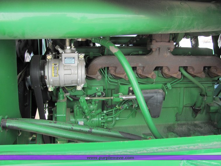 image for item 3025 2005 John Deere 7460 cotton stripper