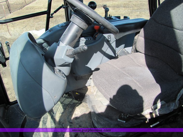 image for item 3034 1999 New Holland TV140 Bidirectional tractor