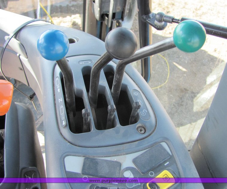 image for item 3034 1999 New Holland TV140 Bidirectional tractor