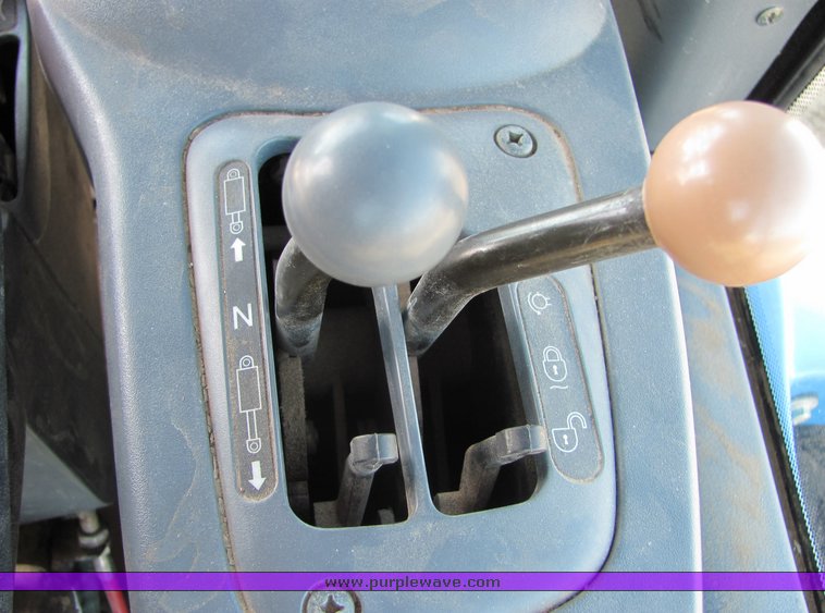 image for item 3034 1999 New Holland TV140 Bidirectional tractor