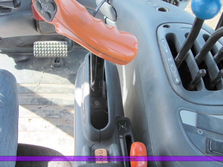 image for item 3034 1999 New Holland TV140 Bidirectional tractor