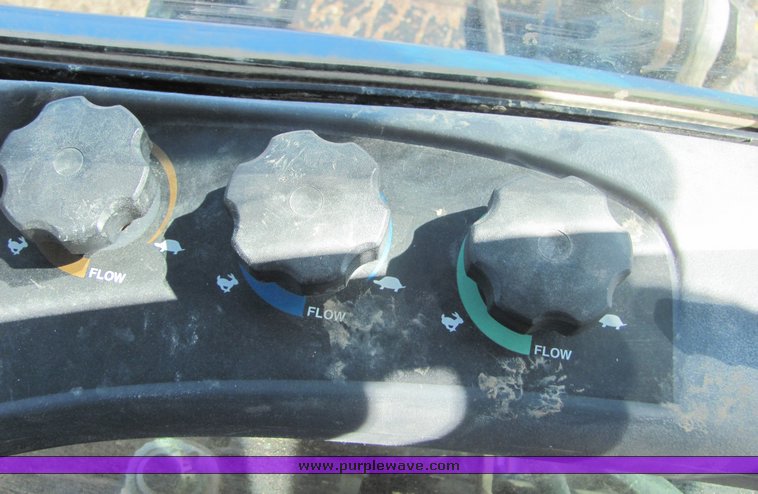 image for item 3034 1999 New Holland TV140 Bidirectional tractor