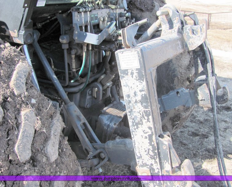 image for item 3034 1999 New Holland TV140 Bidirectional tractor