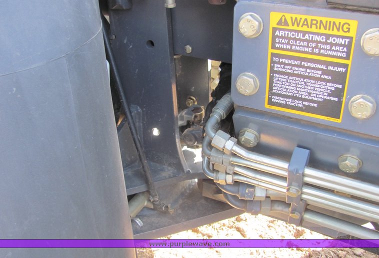 image for item 3034 1999 New Holland TV140 Bidirectional tractor