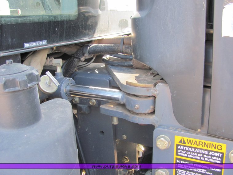 image for item 3034 1999 New Holland TV140 Bidirectional tractor