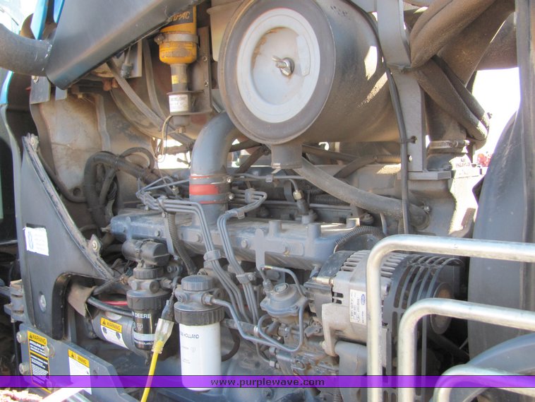 image for item 3034 1999 New Holland TV140 Bidirectional tractor