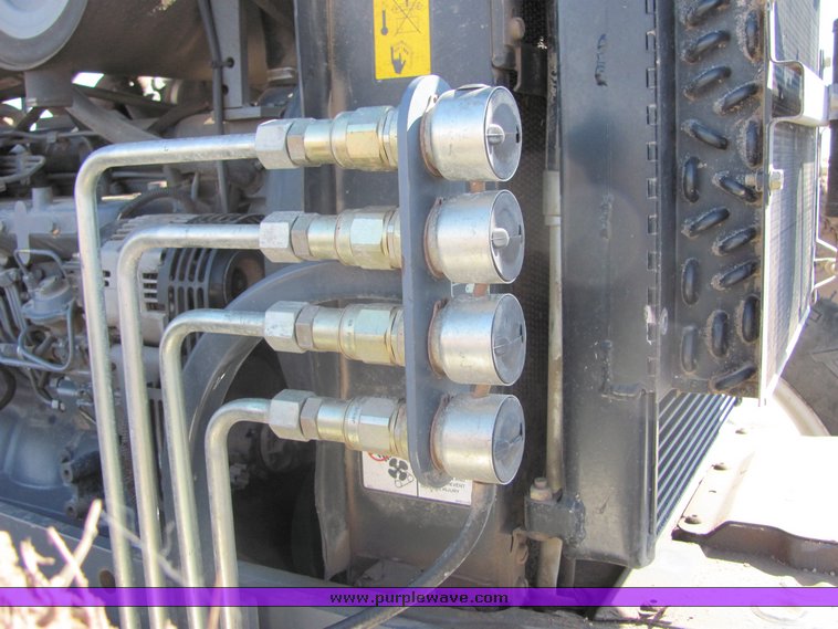 image for item 3034 1999 New Holland TV140 Bidirectional tractor