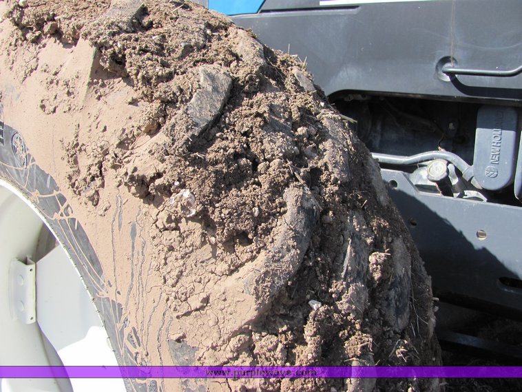 image for item 3034 1999 New Holland TV140 Bidirectional tractor