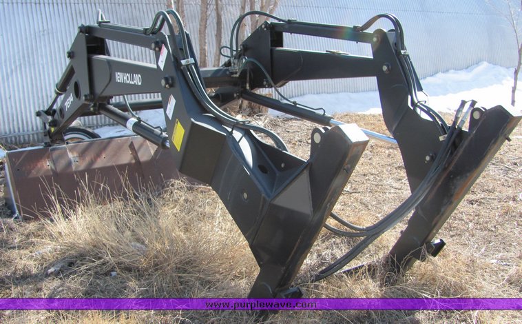 image for item 3034 1999 New Holland TV140 Bidirectional tractor