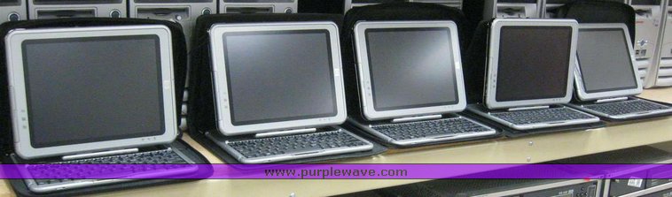 image for item 7909 (5) Compaq TC1100 laptops