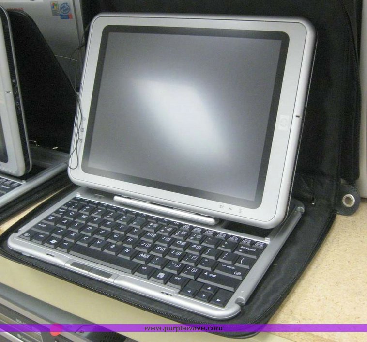 image for item 7909 (5) Compaq TC1100 laptops