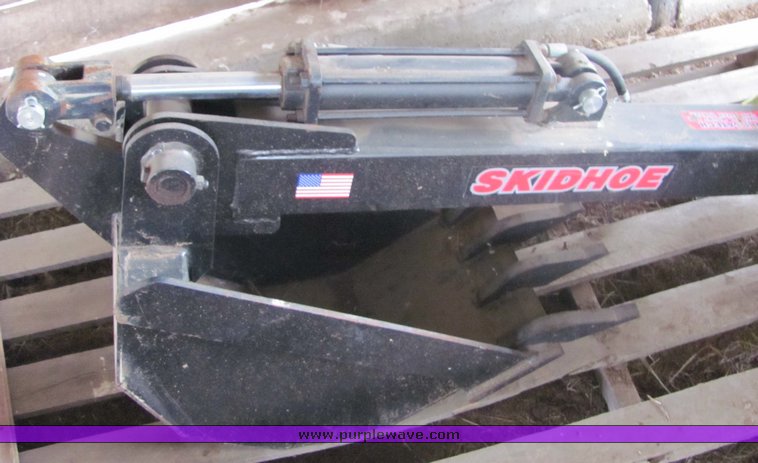 image for item 3200 Skidhoe backhoe skidsteer attachment