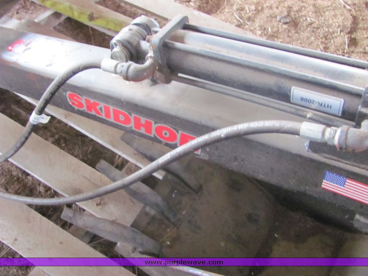 image for item 3200 Skidhoe backhoe skidsteer attachment