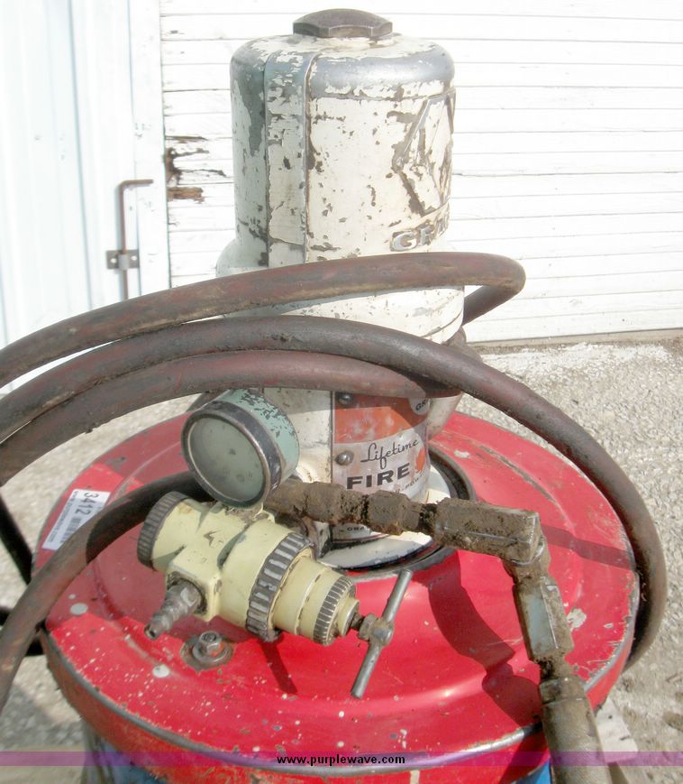 image for item 3412 Graco pneumatic grease pump with barrel