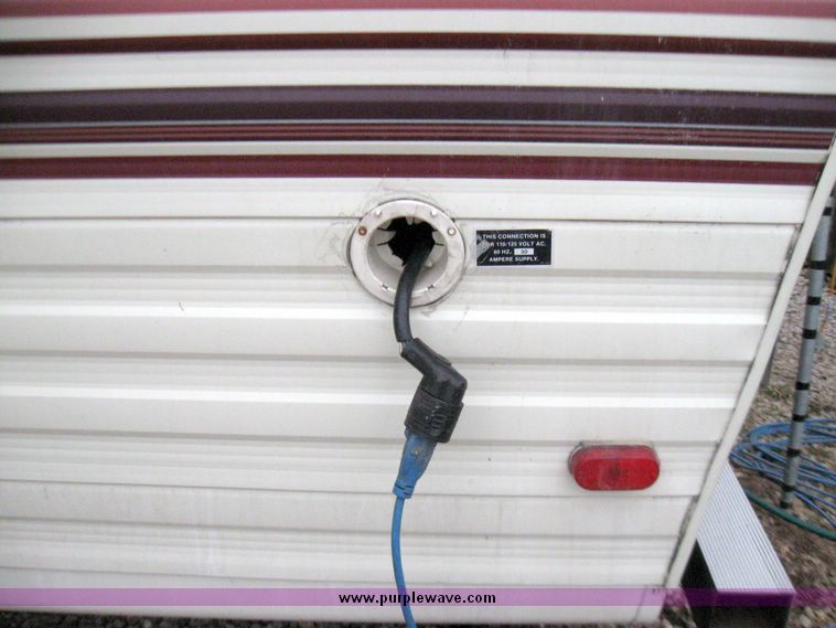 image for item 5570 1993 Sierra by Cobra camper trailer