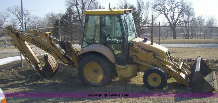 image for item 4608 New Holland 555E backhoe