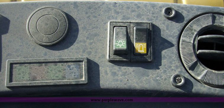image for item 4608 New Holland 555E backhoe