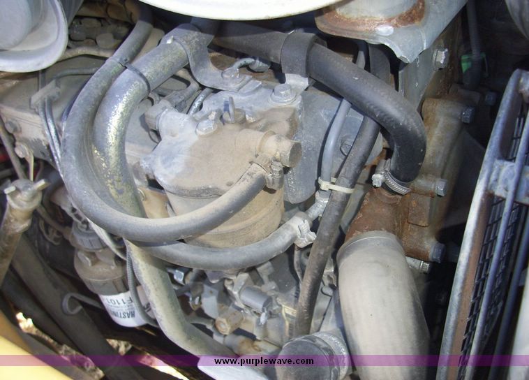 image for item 4608 New Holland 555E backhoe