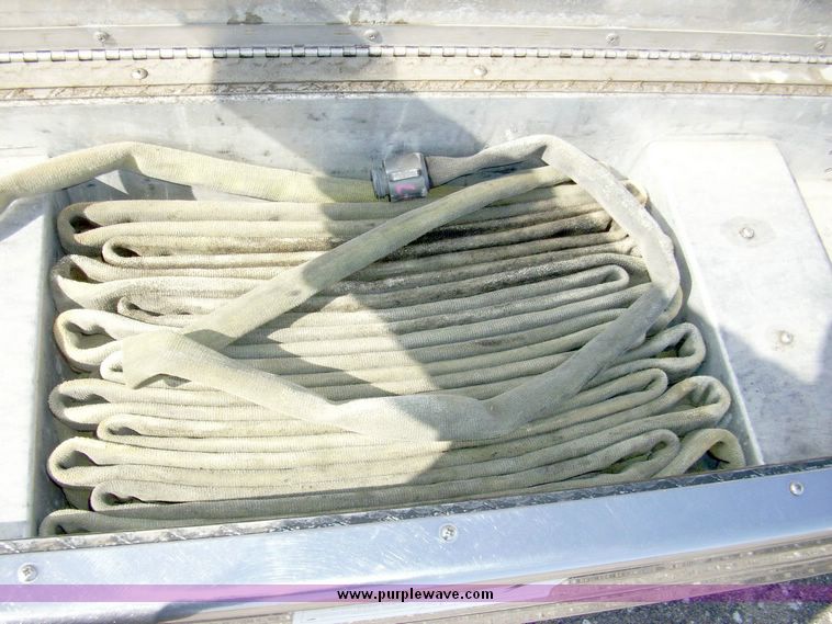 image for item 4651 1993 Sutphen HS2789 75' Quint aerial platform truck