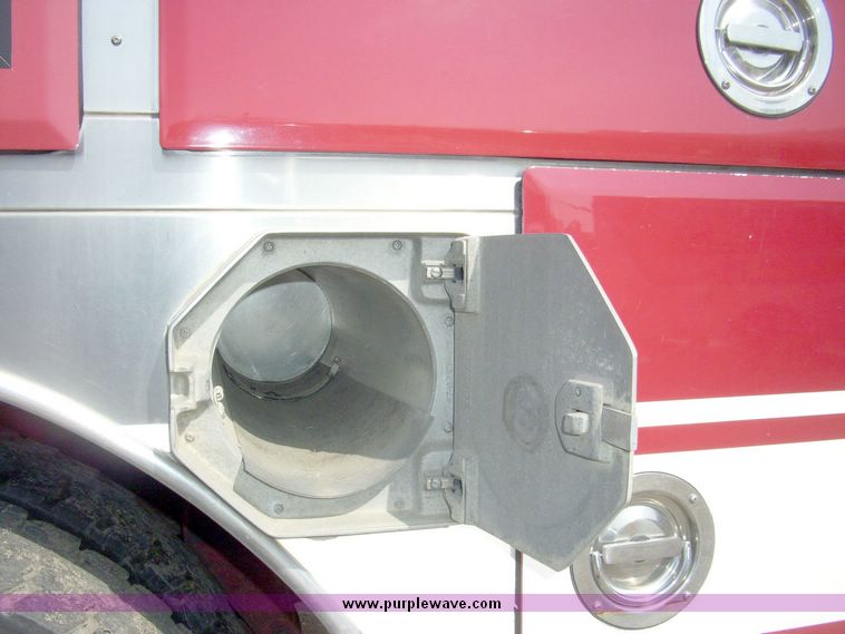 image for item 4651 1993 Sutphen HS2789 75' Quint aerial platform truck