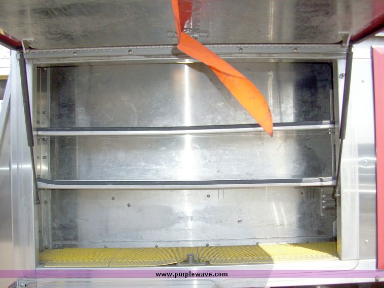 image for item 4651 1993 Sutphen HS2789 75' Quint aerial platform truck